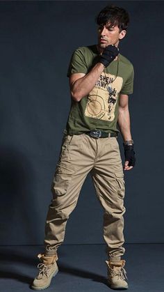 These high-quality khaki casual pants for men combine military-inspired design with comfort. Featuring a camouflage pattern, multi-pocket styling, and a trendy jogger silhouette, these black army trousers are both fashionable and functional for a stylish yet practical look. Army Trousers, Cargo Pants Outfit Men, Casual Khaki Pants, Trendy Joggers, Casual Pants Men, Camouflage Cargo Pants, Pants Outfit Men, Cargo Pants Outfit, Black Army