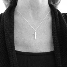 "A hammered modern sterling silver cross necklace....simple and minimalist. - Sterling silver cross, just over 3/4\" (2.1 cm) in height (including the tiny top ring, not large ring), just under 1/2\" (12 mm) across. - Necklace length 17\" (43.1 cm), 1.5 mm cable chain, lobster clasp, and locking circle jump rings, all sterling silver. - Cross is a hint larger than 12 gauge (2 mm), so thick and sturdy but not heavy. - Hammered on both sides by me and then tumbled for the ultimate silver shine. Lo Everyday Minimalist Cross Pendant Necklace, Minimalist Daily Wear Cross Pendant Necklace, Simple Everyday Cross Jewelry, Minimalist Everyday Cross Necklace, Simple Sterling Silver Cross Pendant Necklace, Simple Everyday Cross Pendant Necklace, Simple Everyday Cross Necklace, Minimalist Sterling Silver Cross Pendant Necklace, Minimalist Sterling Silver Cross Necklace