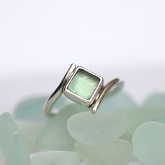 Sea glass engagement ring. Contemporary Hand shaped natural Sea glass engagement ring.  The 'Delphin' engagement ring... contemporary and modern with a beautiful  square hand shaped sea glass. This sea glass ring has been made with a hand shaped piece of natural sea glass (approx 6mm square).  This listing is for a ring made in this same style in your size with choice of seaglass. Please message with your colour preference to view available options before ordering. I hand shape genuine sea glass Christmas Engagement Announcement, Glass Engagement Ring, Coin Pearl Earrings, Australian Opal Ring, Sea Glass Ring, Contemporary Engagement Rings, Christmas Engagement, Glass Ring, Glass Rings