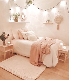 a bedroom decorated with plants and lights