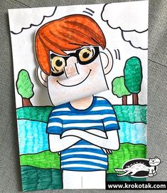 a paper cut out of a boy with glasses and a blue striped shirt, standing in front of trees