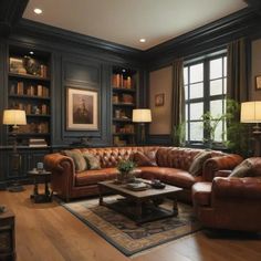 a living room filled with furniture and bookshelves