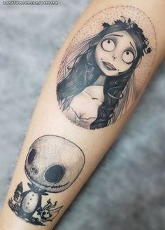 a girl with a skull tattoo on her arm