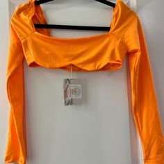 -Bright Orange Top -Never Worn -Stretchy Material -Good For Costumes Or Parties Trendy Orange Crop Top For Fall, Vibrant Stretch Summer Tops, Spring Orange Stretch Tops, Trendy Orange Crop Top For Spring, Orange Fitted Crop Top For Spring, Fitted Orange Crop Top For Spring, Fitted Orange Top For Night Out, Vibrant Fitted Spring Tops, Vibrant Orange Fitted Top