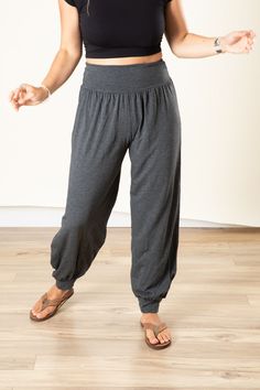 Lounge or practice your asanas in exotic style with our Jum Jum jersey harem pants. After seeing stylish women rocking these fabulous harem pants literally everywhere we travel, once the Mexicali crew tried them on, we understood why! So soft and flowy, these gorgeous hippie pants are ready to rock any adventure you can come up with. They make an awesome pair of stretchy yoga pants, funky high waisted festival pants, or the ultimate cozy travel pants. The elastic-hemmed legs can be worn low on t Cozy Travel, Festival Pants, Hippie Pants, Exotic Fashion, Travel Pants, Purple Teal, Black Charcoal, Stylish Women, Bohemian Style