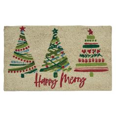 a door mat with three christmas trees on it