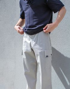 LIMITED High quality, hand made, designer men's pants, made with this high quality breathable fabric in a light grey is structured and comfortable!  Fits best W32 Inseam: 34" Two side pockets and a fly zipper! Modeled by: Carter Ragsdale Gray Cargo Pants With Pockets, Urban Beige Pants With Pockets, Gray Cotton Work Pants With Pockets, Gray Straight Cargo Pants With Pockets, Gray Cargo Pants With Cargo Pockets, Gray Straight Leg Cargo Pants With Pockets, Gray Utility Pants With Pockets, Gray Utility Cargo Pants With Multiple Pockets, Relaxed Fit Cargo Pants With Welt Pockets For Streetwear