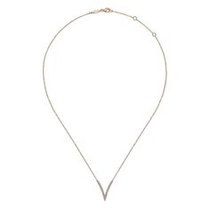 Work your angles in this chic fashion necklace. A minimalist "V" shaped pendant is outlined in 0.28cts of scintillating pave diamonds Shine brightly with the gorgeous "V" Shaped Diamond Pendant from Gabriel & Co. Delicately outlined in 0.28cts of sparkling pave diamonds, this necklace adds a touch of elegance to any outfit. Its chic and minimalist design will enhance your natural angles and bring a touch of sophistication to your look. Available in 14K or 18K white, rose or yellow gold Includes pendant box Includes jewelry appraisal 17" chain included Ships fully insured to point of delivery Kirk Kara Engagement Rings, Gabriel Jewelry, Black Friday Jewelry, Gemstone Earrings Gold, Bridesmaid Gifts Jewelry, Silver Pearl Necklace, Gold Gemstone Ring, Jewelry Appraisal, Diamond Dangle Earrings