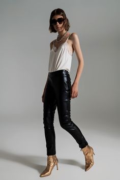 Introducing our Black Faux Leather Effect Skinny Pants, a must-have wardrobe staple that combines edgy style with a flattering silhouette. These full-length skinny pants are designed to fit like a second skin, hugging your curves in all the right places. The sleek and skinny fit adds a touch of sophistication to any outfit, making them perfect for parties and special occasions. Crafted from a combination of 55% Polyurethane and 45% Polyester, these pants boast a faux leather effect that exudes a Cream Shirt, Color Crema, Stylish Party, Lace Trims, Lace Cami, Edgy Look, Cami Top, Look Chic, Fast Fashion