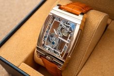 DESCRIPTION: This is a fine classic mechanical watch. It does not require battery. All the parts on this watch is beautifully crafted. Cool thing about this watch is that you can actually see through front to back, to sides and you can enjoy all the gears move inside the watch. Comes with quality gift box. COLOR: ROSE GOLD WITH ORANGE GENUINE LEATHER BAND (20mm LINK) WATCH CASE SIZE: 32MM X 51MM DISPLAY: ANALOG CASE: STAINLESS STEEL MOVEMENT: MANUAL MECHANICAL WATER RESISTANCE RATING: 3ATM (30 M Rose Gold Watches With Skeleton Rectangular Dial, Rose Gold Watch With Skeleton Dial And Rectangular Shape, Elegant Automatic Watch Accessories For Gift, Rose Gold Rectangular Watch With Skeleton Dial, Rectangular Skeleton Dial Watch As A Gift, Rectangular Skeleton Dial Watch For Gift, Luxury Watch Accessories With Rotating Bezel As Gift, Elegant Brown Watches With Skeleton Dial, Elegant Brown Watch With Skeleton Dial