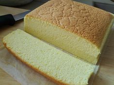 a loaf of cake sitting on top of a cutting board