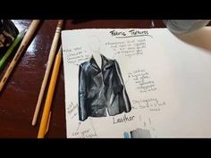 a drawing of a leather jacket on top of a piece of paper