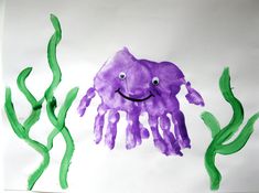 a paper plate with an image of a purple jellyfish and green seaweed on it