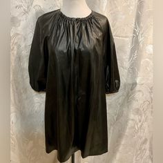 Nwt. Black A-Line Polyurethane Dress. Elastic Puffy Sleeves. No Stretch. 1 Button In The Front. Size M Armpit To Armpit 20” Length 36” Puffy Sleeves, Who What Wear, Black Faux Leather, Wearing Black, Colorful Dresses, A Line, Faux Leather, Mini Dress, Elastic