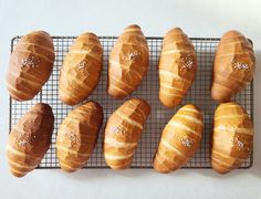 nine loaves of bread on a cooling rack