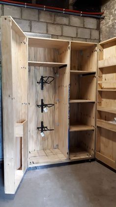 an unfinished wooden cabinet with eyeglasses on the door and glasses in it's shelves