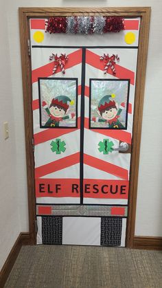 a door decorated to look like an elf's house with the words elf rescue on it