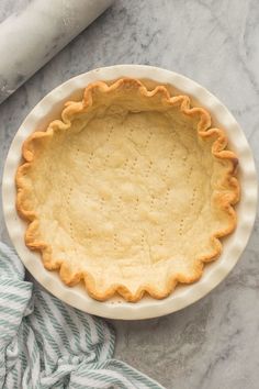 an uncooked pie sitting on top of a table