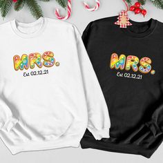 The Price is for ONE sweatshirt. HOW TO ORDER: 1. Choose the color of the sweatshirt and the size you want. 2. In the personalization box, please write the date. 3. Add to the cart. 4. Repeat for each sweatshirt. Mrs. & Mrs. Christmas Gingerbread Cookie sweatshirts. The best lesbian Christmas wedding sweatshirt! Celebrate Christmas with these funny lesbian sweatshirts! Sweatshirt Details:  * 50% cotton, 50% polyester * Pre-shrunk * Classic fit * 1x1 athletic rib knit collar with spandex * Air-je Queer Christmas, Lesbian Christmas, Bride And Bridesmaid Shirts, Funny Lesbian, Lesbian Wedding Gifts, Wedding Sweatshirts, Gay Christmas, Xmas Pjs, Pride Wear