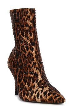 Sparkling crystals illuminate the bold leopard pattern of a pointy-toe bootie lifted by a sleek stiletto heel. 3 3/4" heel (size 8.5) 6 1/2" shaft Side zip closure Synthetic upper, lining and sole Imported Asian & Pacific Islander Owned/Founded Animal Print Boots, Leopard Print Boots, Dopamine Dressing, Pacific Islander, Dress Booties, Girl Boots, Azalea Wang, Tiktok Fashion, Pointed Toe Shoes