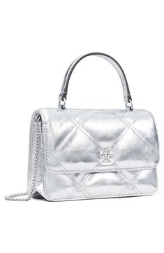 Signature logo hardware stands out against the quilted metallic leather of a structured crossbody fitted with a top carry handle and optional chain strap for versatile wear. Magnetic-snap flap closure Top carry handle; removable chain crossbody strap Interior zip and wall pockets Structured silhouette with flat base for stability Lined Leather Imported Tory Burch Kira, Tory Burch Tote, Quilted Wallet, Chain Wallet, Metallic Bag, Mini Quilt, Functional Accessories, Diamond Quilt, Wall Pockets