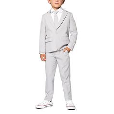 Perfect for a fall or winter special occasion, this 3-piece suit set from Opposuits' toddler boy's collection is made from breathable woven fabric to keep him comfortable. It includes a single-breasted blazer with notch lapels, straight-leg pants with a zip with hook-and-eye closure and side pockets, and a matching clip-on tie. Style it with a crisp crew neck t-shirt or button-down with sneakers.# Pieces In Set: 3Included: 1 Tie(s)1st Piece Description: Blazer1st Piece Collar: Banded Collar1st Piece Front Style: Single Breasted1st Piece Fabric: Woven1st Piece Fiber Content: 100% Polyester1st Piece Lining Material: Polyester1st Piece Care: Machine Wash, Line Dry2nd Piece Description: Pants2nd Piece Closure Type: Button, Hook And Loop + Zipper2nd Piece Front Style: Flat Front2nd Piece Pocket Outfit Graduacion, Boys First Communion, Grey Two Piece, Wedding Party Outfits, Party Kleidung, Slim Fit Suits, Classic Jacket, Formal Style