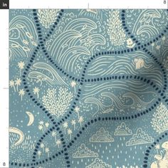 an image of a blue and white fabric with clouds, stars and trees on it