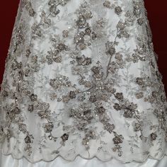 Handmade, high quality Beaded & Rhinestone 3D Floral Multitone Lace Fabric Embroidered on 100% Polyester Net Mesh. Durable heavy weight fabric. Beautiful on wedding dresses, evening gowns, dance costumes, and more. Content: 100% Polyester / Minimum Order: 1 Yard / Size: Approximately 56" Wide / Ships within 24 business hours Colors: This product comes in 4 different colors. Elegant Embellished Embroidered Fabric For Mother Of The Bride, Elegant Embellished Fabric For Mother Of The Bride, Elegant Silver Sequin Fabric With Floral Embroidery, Elegant Lace Fabric With Pearl Embroidery, Elegant Embellished Embroidered Fabric, Elegant Embroidered Lace Tulle Fabric, Elegant Silver Floral Embroidered Fabric, Elegant Embroidered Net Lace, Elegant Floral Embroidered Net Fabric