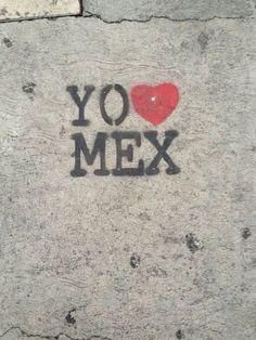 graffiti on the side of a wall that says yo mex with a red heart