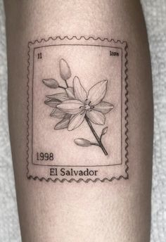 a stamp with a flower on it and the words el salvador written in black ink