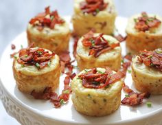 small appetizers are arranged on a white plate