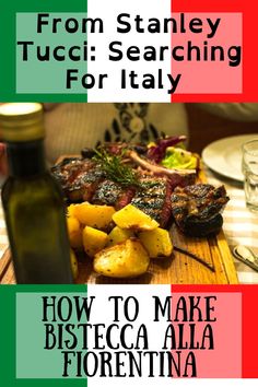 a wooden cutting board topped with steak and potatoes next to a bottle of olive oil