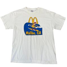 Size: Large- 21" x 28" Condition: No holes, rips or stains Color: White Brand: Hanes Date: 1990s Material: 100% Cotton 90s Fast Food, California 90s, Surfing Vintage, Vintage Mcdonalds, Surf Vintage, Surf Tshirt, Malibu California, White Brand, Beach Vibes