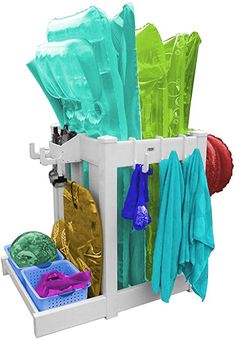 a rack that has some towels and other items in it