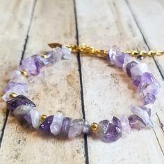 Bracelet Made With Natural Amethyst Gemstone Chip Beads, Golden Spacer Beads, Golden Leaf Charm, Golden 1.5" Extension Chain, And Lobster Clasp Closure. Amethyst Chips Bracelet, Amethyst Crystal Aesthetic, Witchy Products, Gemstone Chips Jewelry, Chip Bead Jewelry, Gemstone Accessories, Gemstone Chips Bracelet, Multi Gemstone Bracelet, Healing Gemstone Bracelets