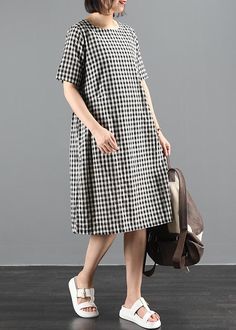 Chic o neck summer clothes Sewing black plaid Dresses

 Materials used:cotton blended

Measurement:One size fits all for this item. Please make sure your size doesn't exceed this size: L/US12-14/EUR42   
   
Shoulder 38cm / 14.82"
bust 100cm / 39"
length 102cm / 39.78"
Armhole 34cm / 13.26"
Sleeve length 26cm / 10.14"



We ship worldwide.

Tracking numbers provided for all orders. Summer Black Plaid Dress, Summer Plaid Dress With Short Sleeves, Casual Black Plaid Midi Dress, Casual Cotton Plaid Dress With Short Sleeves, Black Plaid Cotton Dress For Spring, Black Short Sleeve Cotton Plaid Dress, Black Cotton Short Sleeve Plaid Dress, Casual Spring Dress With Grid Pattern, Casual Plaid Midi Length Dress