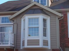 an image of a house with white windows