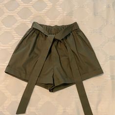 Nwot Army Green High Waist Shorts With Elastic Waist And Tie Front. No Pockets. Never Worn!! Cheap Green School Shorts, Tie Shorts, High Waist Shorts, Shorts Women, High Waisted Shorts, Army Green, Elastic Waist, High Waist, High Waisted