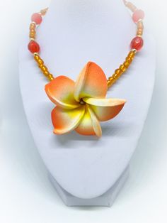 This is an Orange Foam Flower and Bright Orange Faceted Crystal and Orange Glass Seed Bead 16 inch Necklace.  This necklace comprises of a gorgeous centrepiece of a foam flower in orange and bright orange faceted glass beads and seed beads, interspersed with gold colour metal beads. A very contemporary fresh colour scheme. The colours are lovely and bright.  Handmade by myself a UK Jewellery designer. To view more JulieDeeleyJewellery items from my shop please click link below : http://www.etsy.com/shop/JulieDeeleyJewellery Follow me on Facebook: www.facebook.com/juliedeeleyjewellery Follow me on Twitter: @julie_deeley Follow me on Pinterest: pinterest.com/juliedeeley Follow me on Instagram: http://instagram.com/juliedeeley Orange Faceted Beads Jewelry For Gift, Orange Flower Pendant Necklace Gift, Orange Flower Pendant Necklace For Gift, Handmade Orange Flower Pendant Necklace, Orange Flower Pendant Jewelry Gift, Handmade Orange Necklace With Flower Pendant, Orange Flower Pendant Jewelry For Gift, Orange Flower Shaped Beaded Necklace For Gift, Orange Beaded Flower-shaped Jewelry