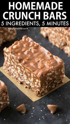 homemade crunch bars with chocolate and nuts in the middle, on a black table top