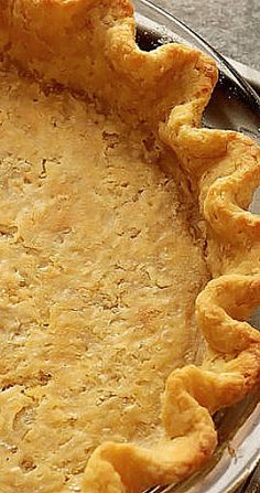 a pie sitting on top of a metal pan