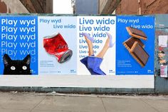 an advertisement on the side of a building for play wydy and live wide