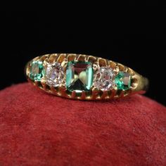 Beautiful Antique Victorian 14K Yellow Gold Old Mine Diamond and Emerald Five Stone Ring. This gorgeous Victorian old mine diamond and emerald ring is crafted in 14k yellow gold. The top of the ring features three chunky old cut emeralds and two old mine cut diamonds in between them. The ring sits low on the finger and is in great condition. Item #R1848 Metal: 14K Yellow Gold Weight: 2.2 Grams  Size: 5 1/2 Diamonds: Approximately .30 cts Color: H Clarity: VS2 Emeralds: Approximately .60 cts Meas Luxury Victorian Emerald Ring For Anniversary, Victorian Antique Ring, Diamond And Emerald Ring, Watch Cufflinks, Multi Stone Ring, Multi Stone, Watch Necklace, Emerald Ring, Antique Victorian