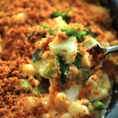 broccoli and cauliflower casserole being spooned with a fork