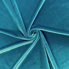 a close up shot of a blue fabric