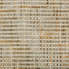 an upholstered fabric with brown and white checkerboard pattern, closeup