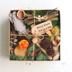 a wooden box filled with lots of different items