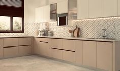 a kitchen with white cabinets and brown trim