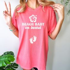 Introducing our "Beach Baby on Board" Comfort Colors shirt, perfect for your summer pregnancy announcement by the sea. Whether it's a cruise or beach vacation, share your joy in style. Ideal for baby showers or gender reveals, its soft fabric ensures comfort while flaunting your bump. White Family Matching T-shirt For Beach, Family Matching T-shirt For Beach Season Vacation, Family Matching T-shirt For Beach Vacation, Family Matching Tops For Beach In Summer, Family Matching Short Sleeve Beach T-shirt, Family Matching Cotton Beach T-shirt, Family Matching White T-shirt For Beach, Family Matching Cotton Tops For Beach Season, Family Matching Cotton Tops For Beach