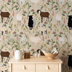 the wallpaper is decorated with farm animals and flowers